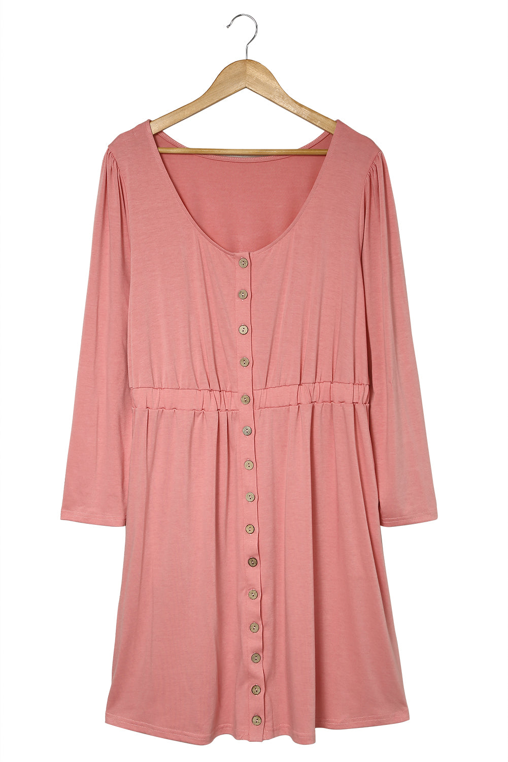 A stylish pink solid button front plus size long sleeve dress displayed on a mannequin, featuring a scoop neck and side pockets.