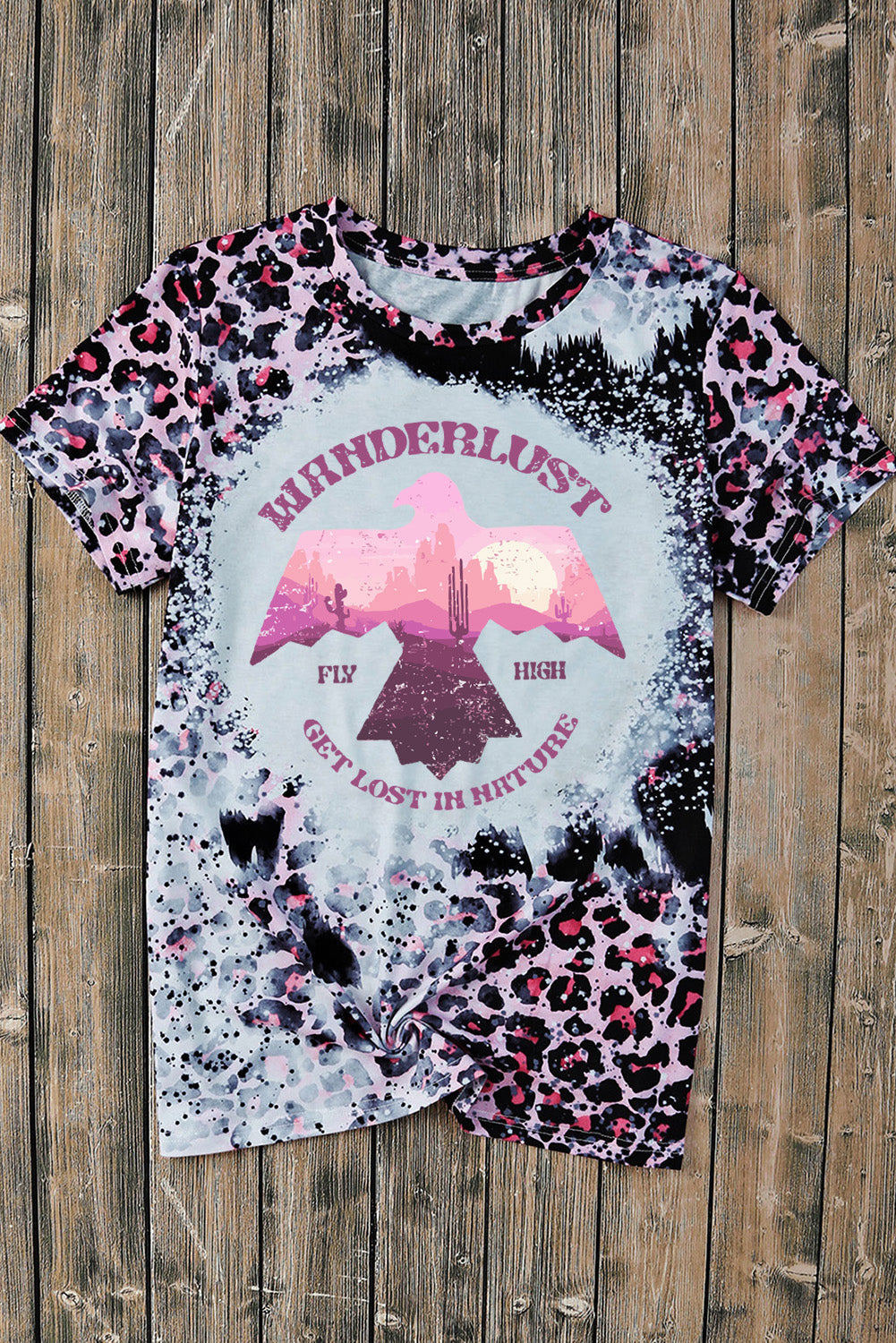 A stylish pink tie dye graphic tee featuring a leopard and eagle design, perfect for casual wear.