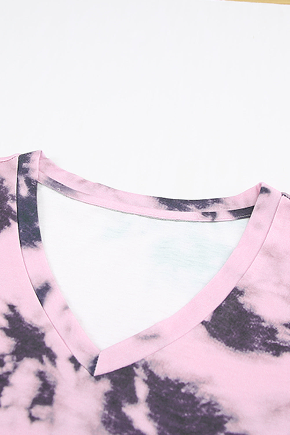 A stylish pink tie-dye V neck t-shirt for women, showcasing a vibrant and trendy design perfect for summer wear.