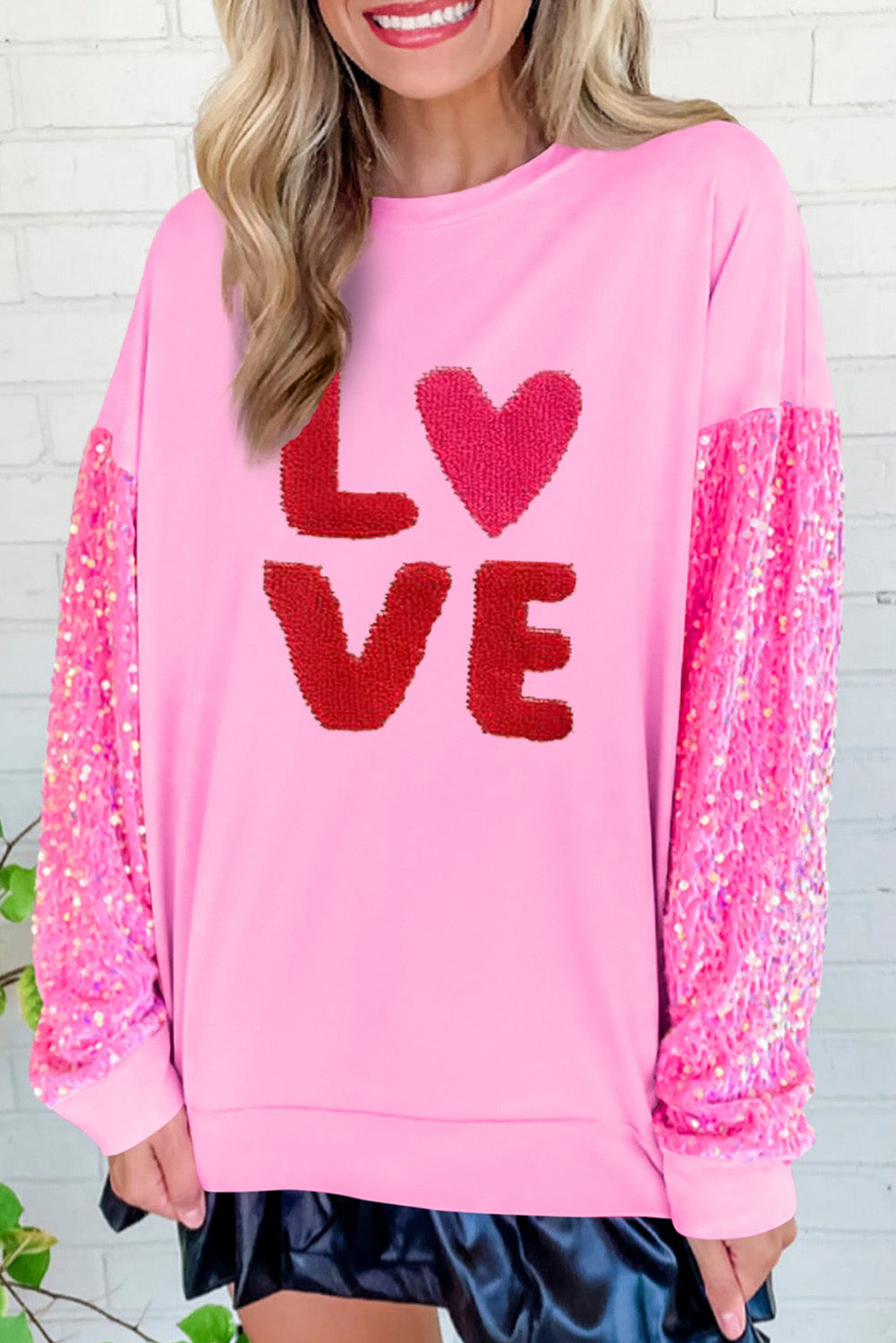 Pink Valentines LOVE Chenille Embroidered Sequin Sleeve Sweatshirt featuring a stylish design with embroidered letters and sparkling sequins.