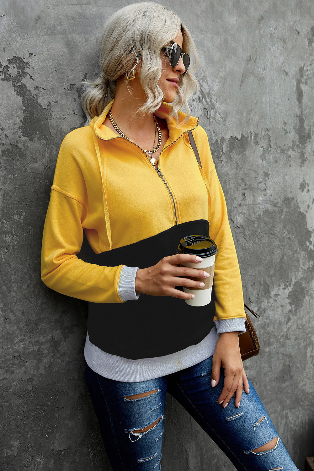 A stylish pink zipped colorblock sweatshirt with pockets, featuring a turn-down collar and a fashionable design, perfect for women.