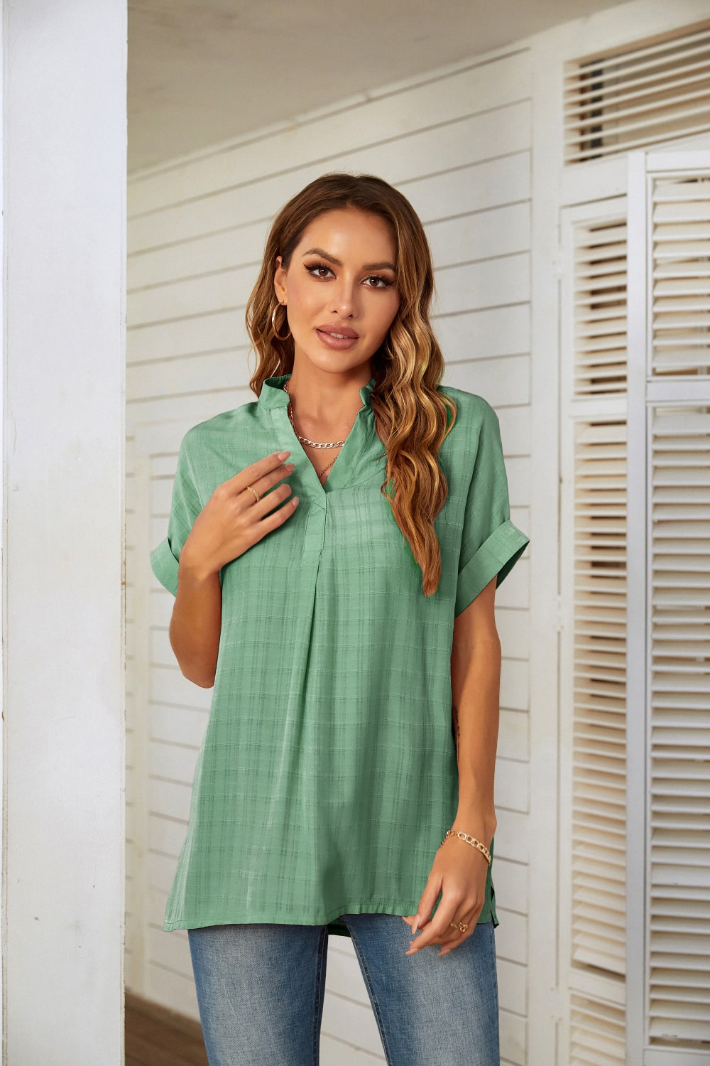 A stylish plaid gathered detail tunic blouse in lightweight fabric, featuring a V-neckline and side slit, perfect for summer wear.