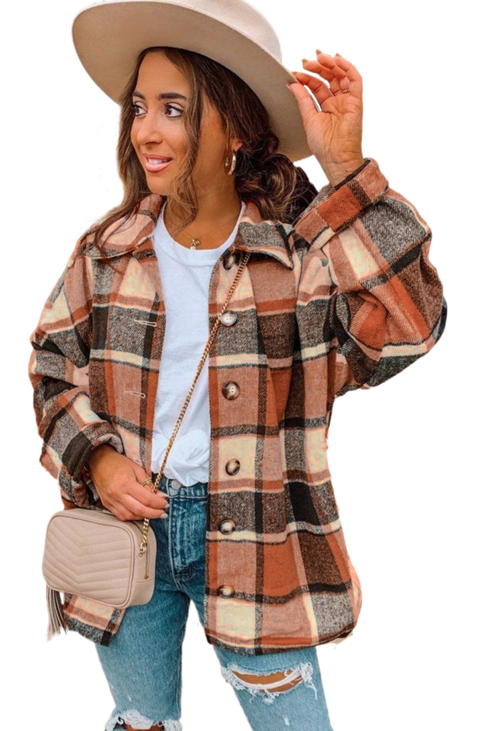 A stylish plaid print buttoned shirt jacket in warm tones, showcasing its soft fabric and button closure design.