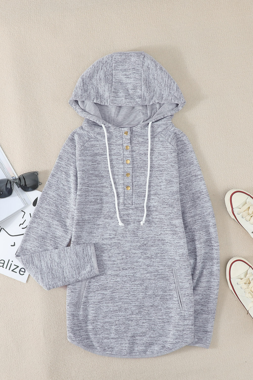 A stylish Pocket Design Buttoned Casual Hoodie in heathered and solid colors, featuring a buttoned front and long sleeves, perfect for casual wear.