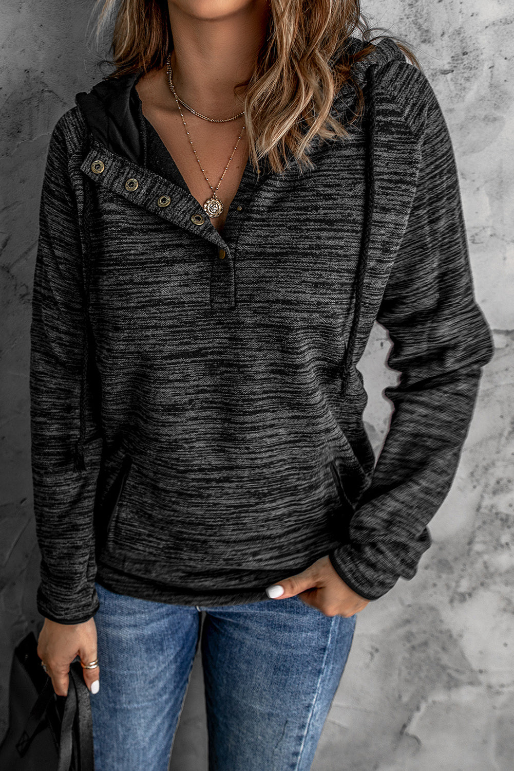 A stylish Pocket Design Buttoned Casual Hoodie in heathered and solid colors, featuring a buttoned front and long sleeves, perfect for casual wear.