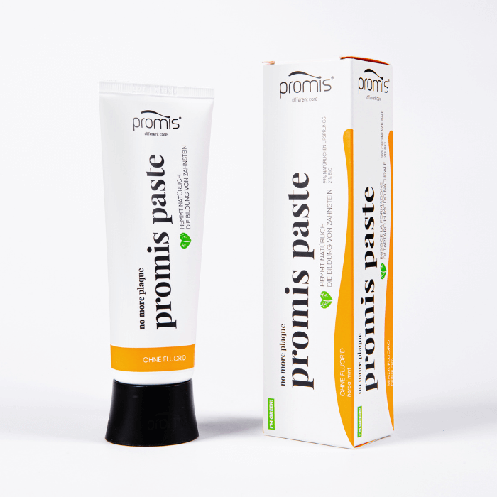 Promis Paste natural toothpaste tube with a fresh mint flavor, showcasing its eco-friendly packaging and natural ingredients.