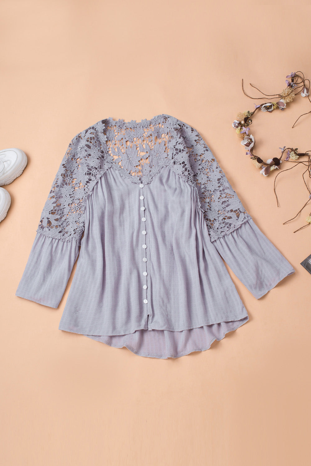 A stylish Purple Crochet Lace Button Top featuring intricate lace detailing, a v-neckline, and ¾ bell sleeves, perfect for various occasions.