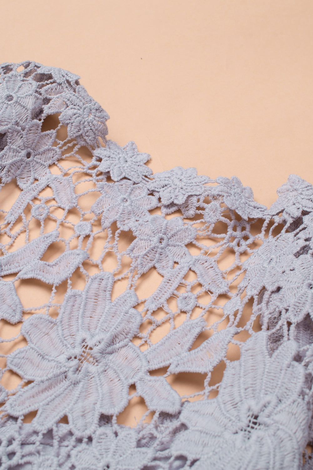 A stylish Purple Crochet Lace Button Top featuring intricate lace detailing, a v-neckline, and ¾ bell sleeves, perfect for various occasions.