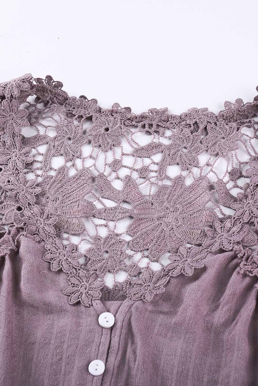 A stylish Purple Crochet Lace Button Top featuring intricate lace detailing, a v-neckline, and ¾ bell sleeves, perfect for various occasions.