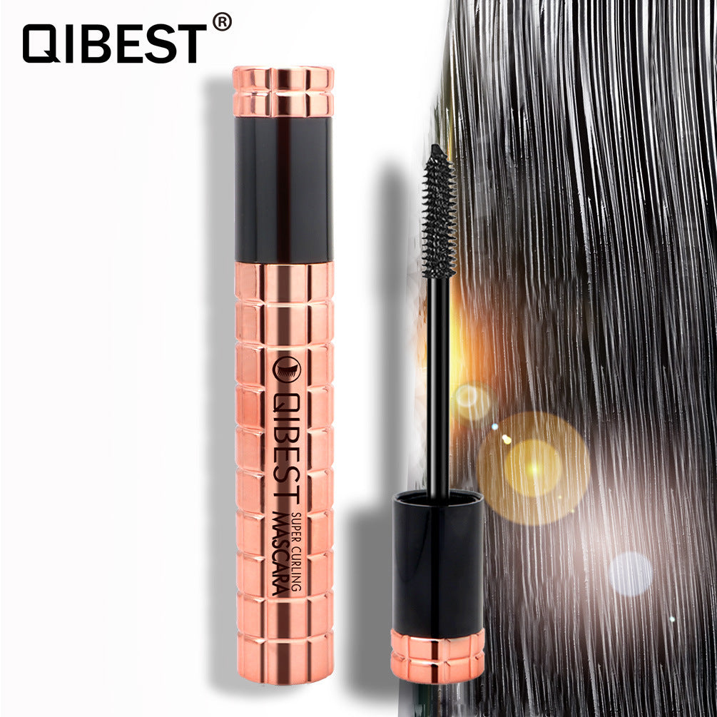 QIBEST Charming Curling Mascara showcasing its sleek packaging and brush design for curling lashes.