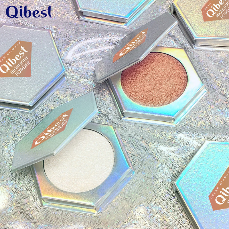 QIBEST Highlighting Powder showcasing a high-gloss diamond sparkle effect in a compact container.