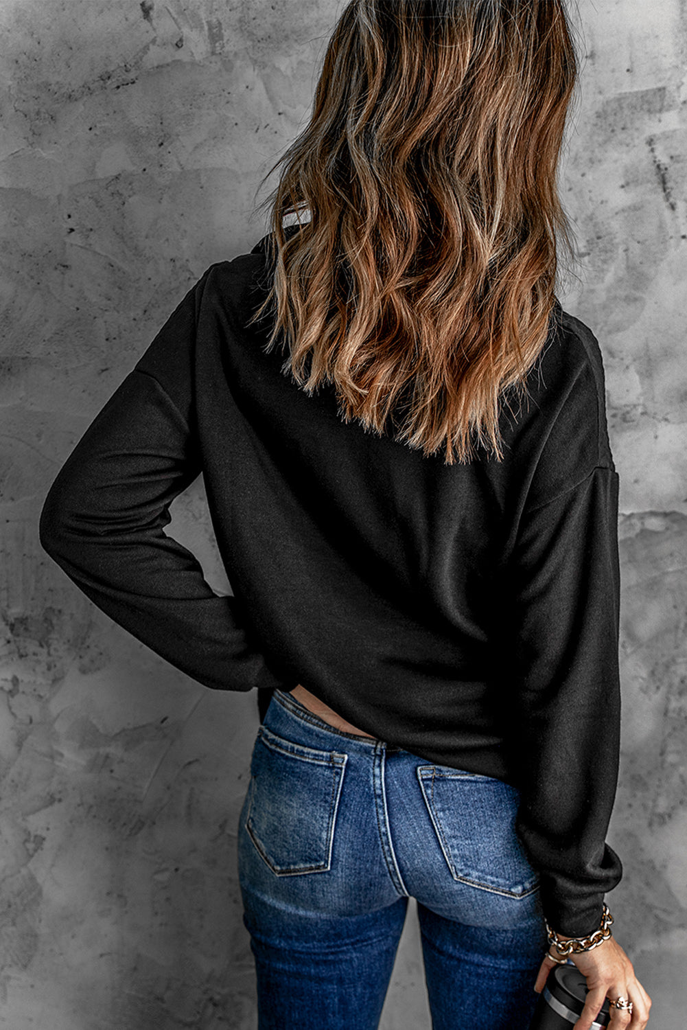 A stylish quilted patch half zipper sweatshirt in solid color, showcasing its unique texture and chic design.