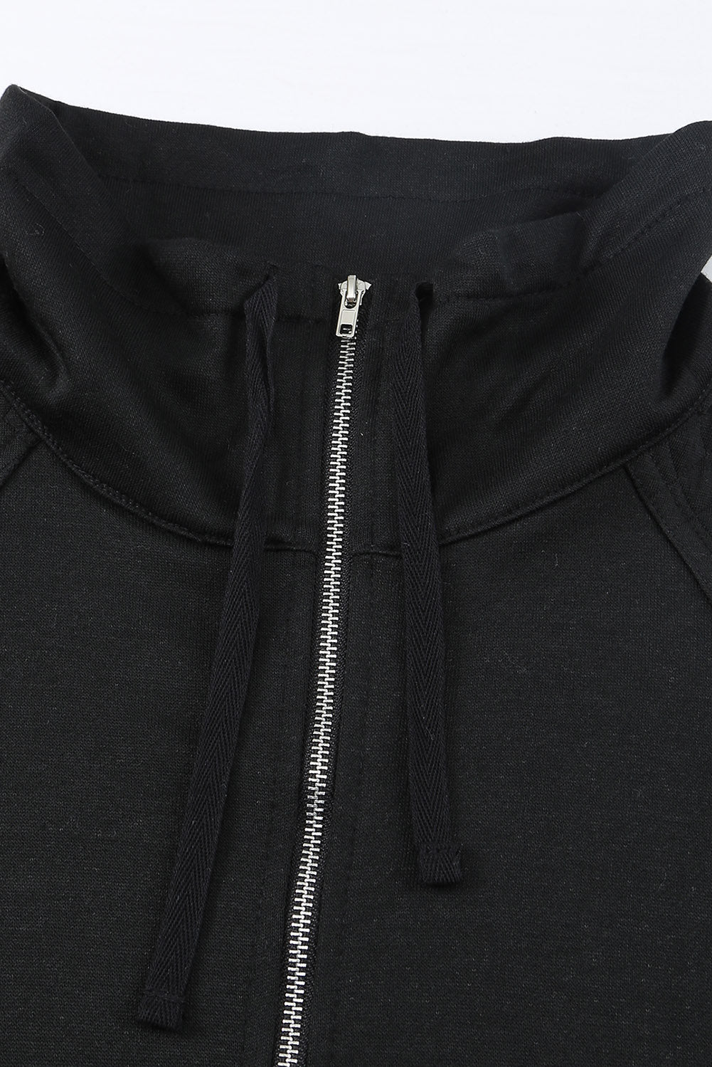 A stylish quilted patch half zipper sweatshirt in solid color, showcasing its unique texture and chic design.