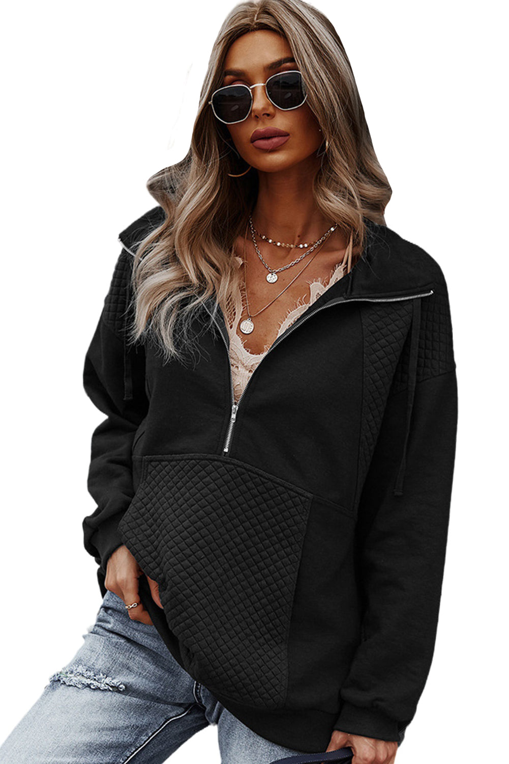 A stylish quilted patch half zipper sweatshirt in solid color, showcasing its unique texture and chic design.