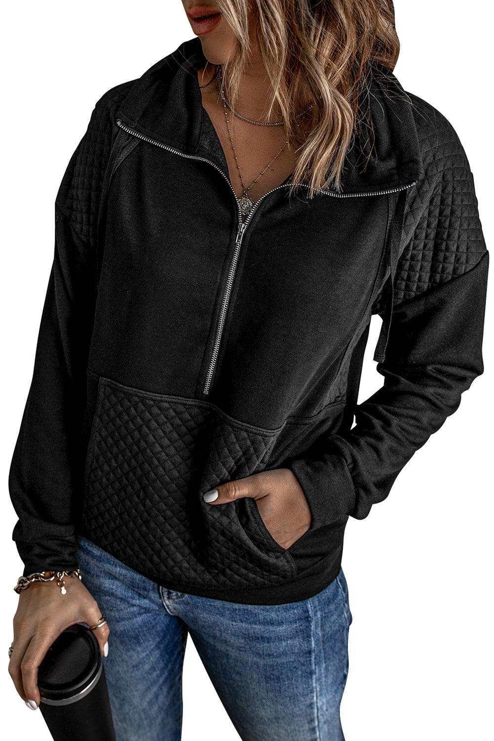 A stylish quilted patch half zipper sweatshirt in solid color, showcasing its unique texture and chic design.