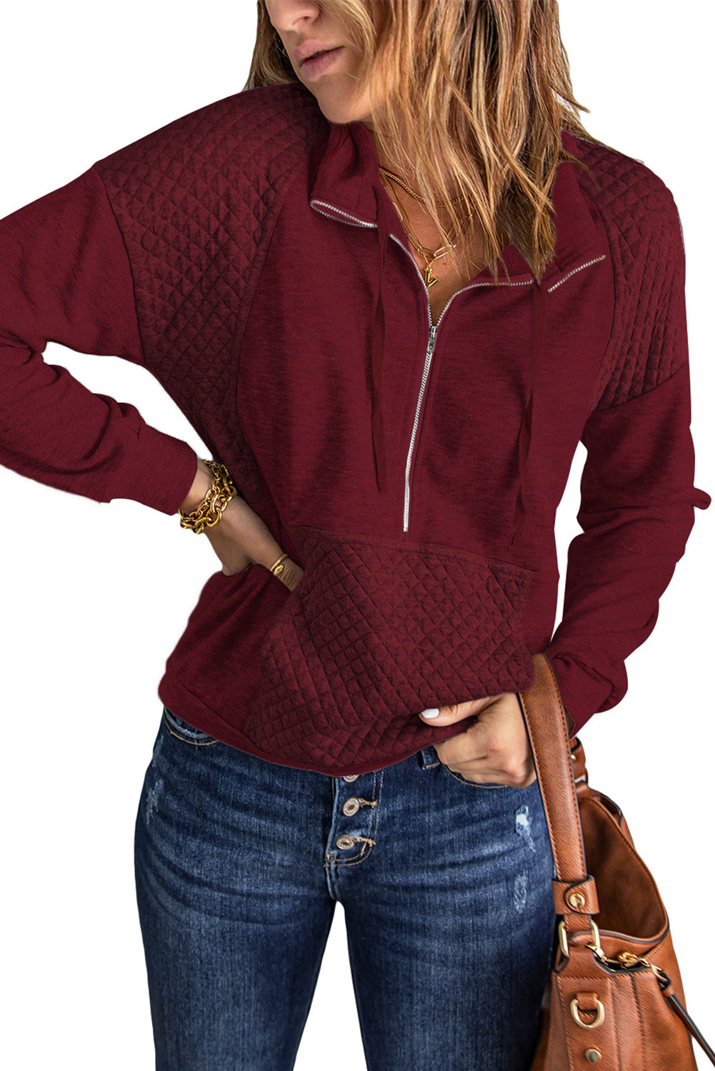 A stylish quilted patch half zipper sweatshirt in solid color, showcasing its unique texture and chic design.