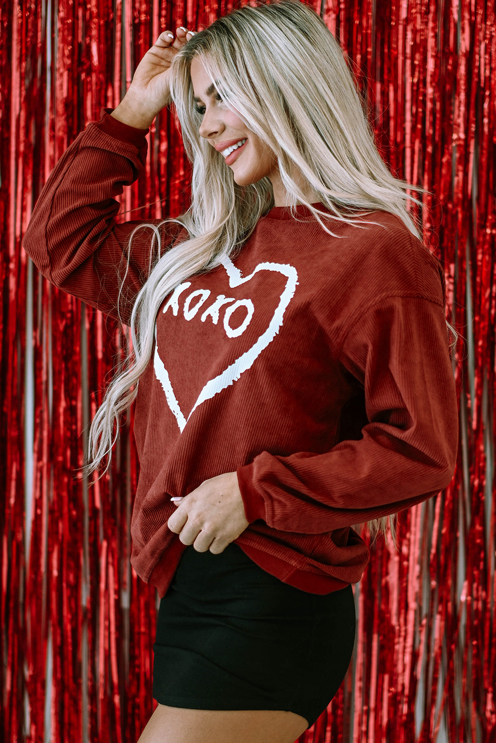 Racing Red XOXO Heart Shape Graphic Corded Sweatshirt featuring a vibrant red color and heart graphic design.