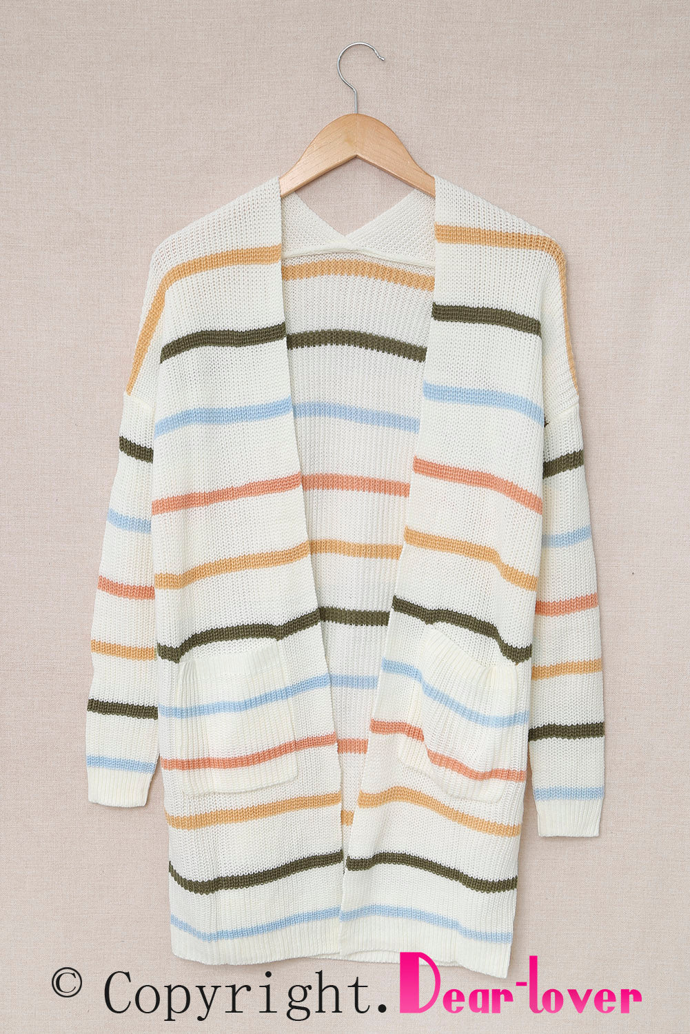 A cozy Rainbow Striped Cardigan featuring vibrant colors and a soft texture, perfect for layering in any season.