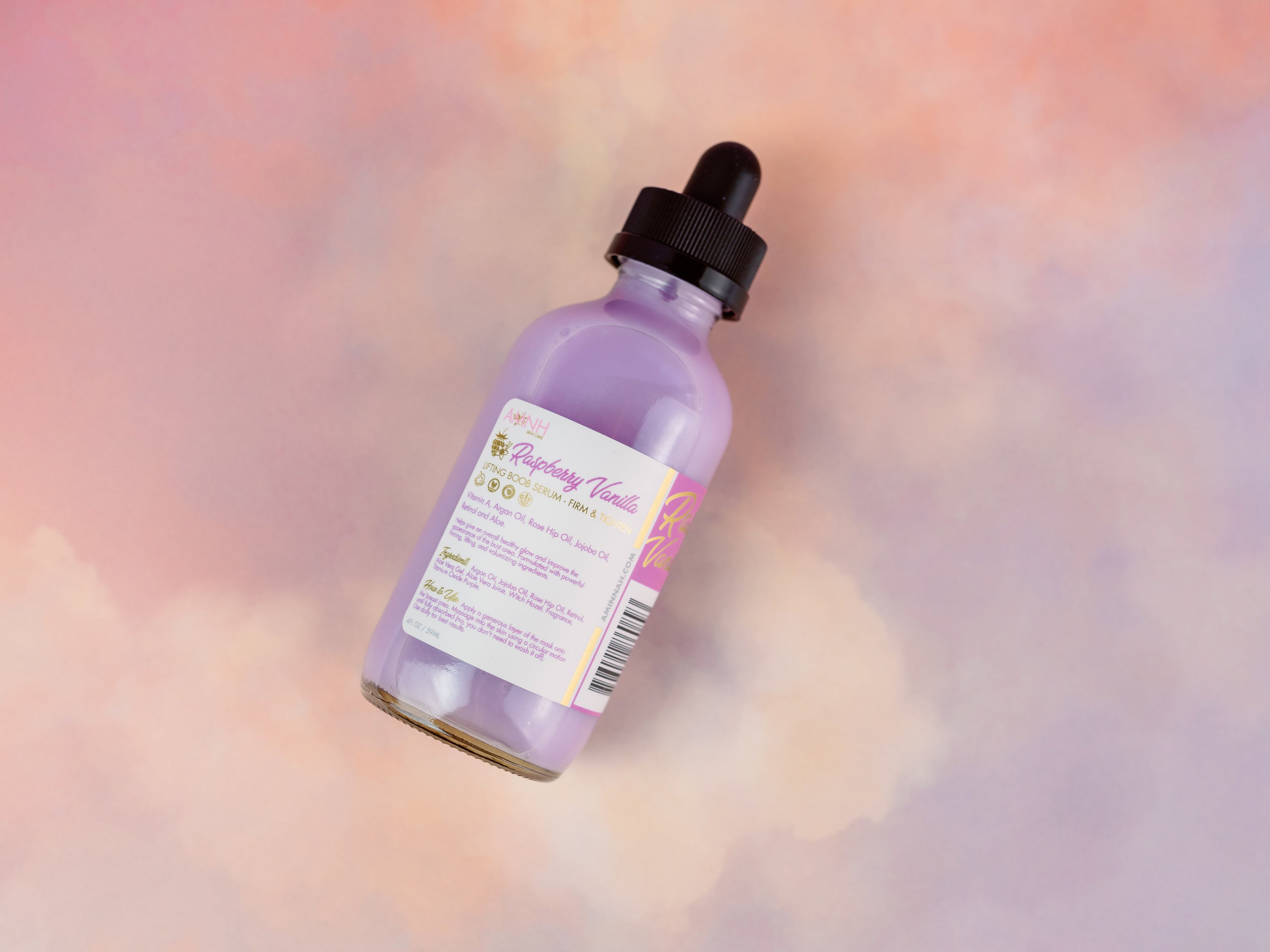 Purple facial serum with dropper.