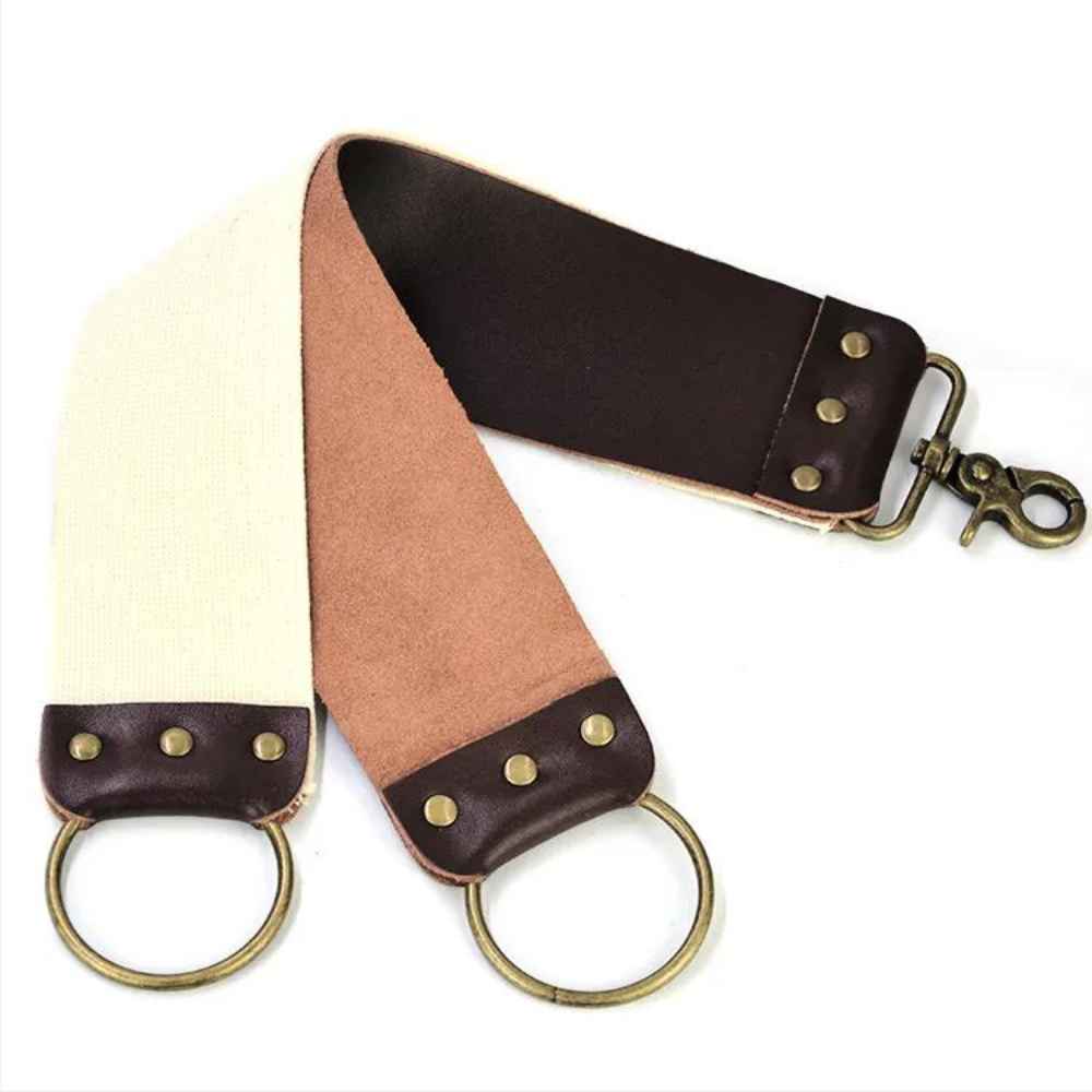 A high-quality Razor Strop featuring vegan leather and canvas straps for sharpening straight razors.