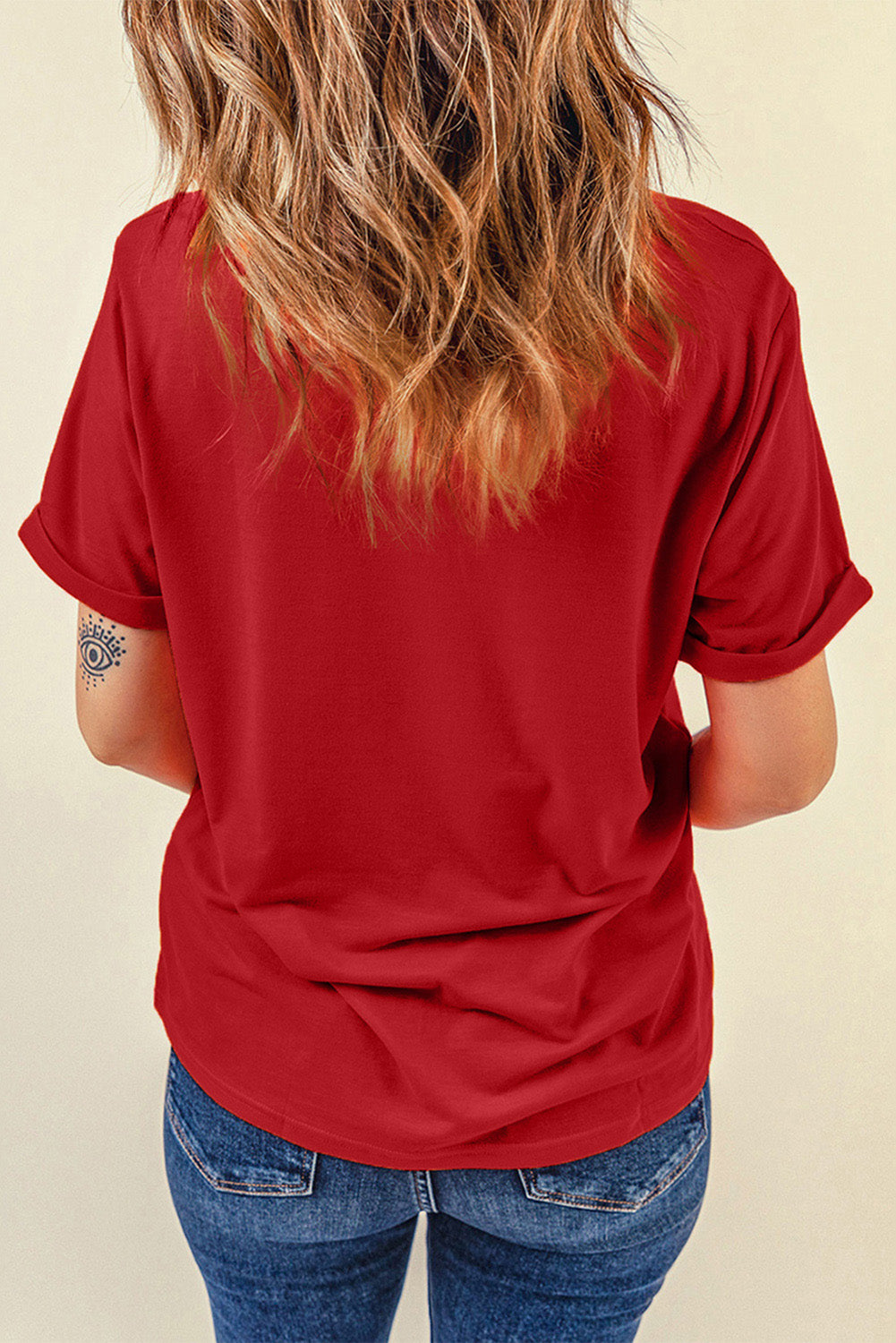 A vibrant red T-shirt featuring a sequined 'LOVE' design, perfect for Valentine's Day and summer wear.