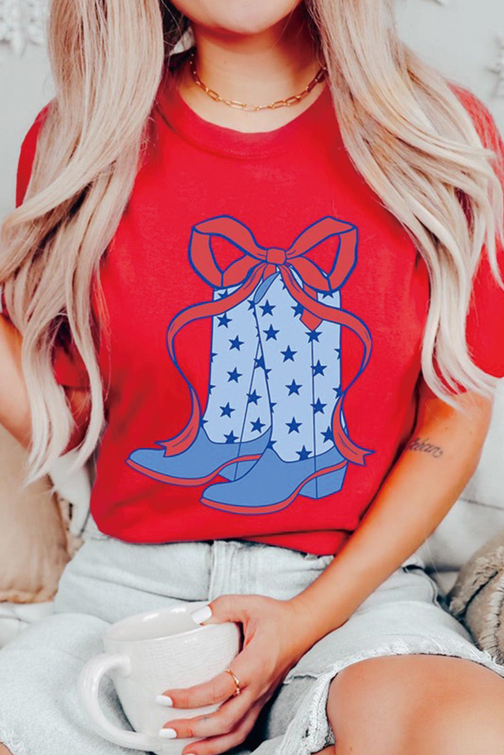 Red Western Star Boots T-Shirt featuring a stylish bow knot print, perfect for casual wear.