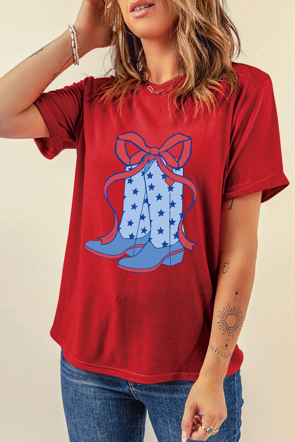 Red Western Star Boots T-Shirt featuring a stylish bow knot print, perfect for casual wear.