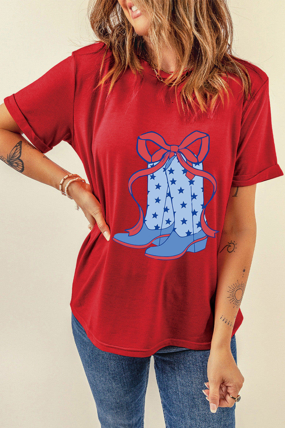 Red Western Star Boots T-Shirt featuring a stylish bow knot print, perfect for casual wear.