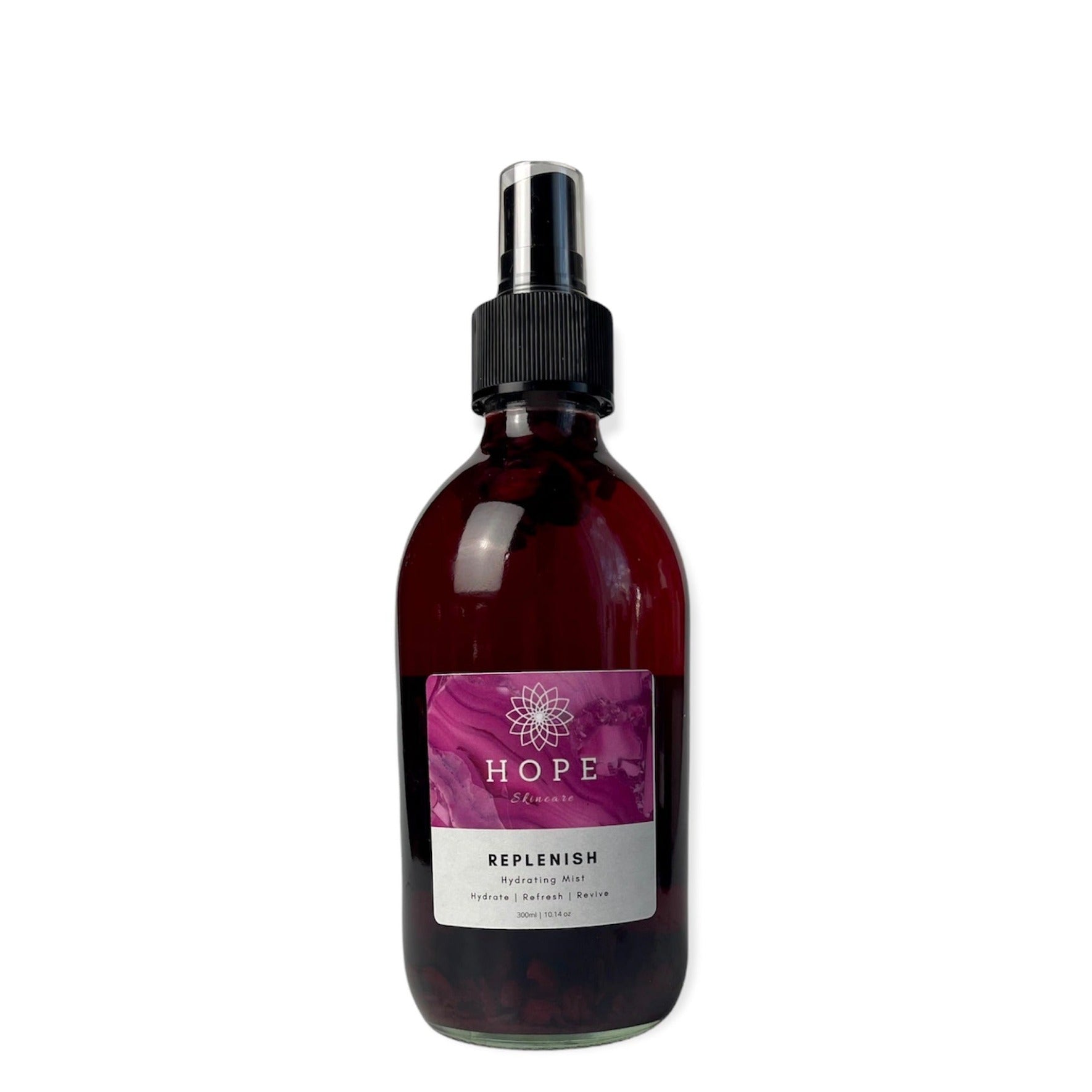 Replenish Hydrating Facial Toner bottle with floral design, showcasing its natural ingredients like Rose and Hibiscus.