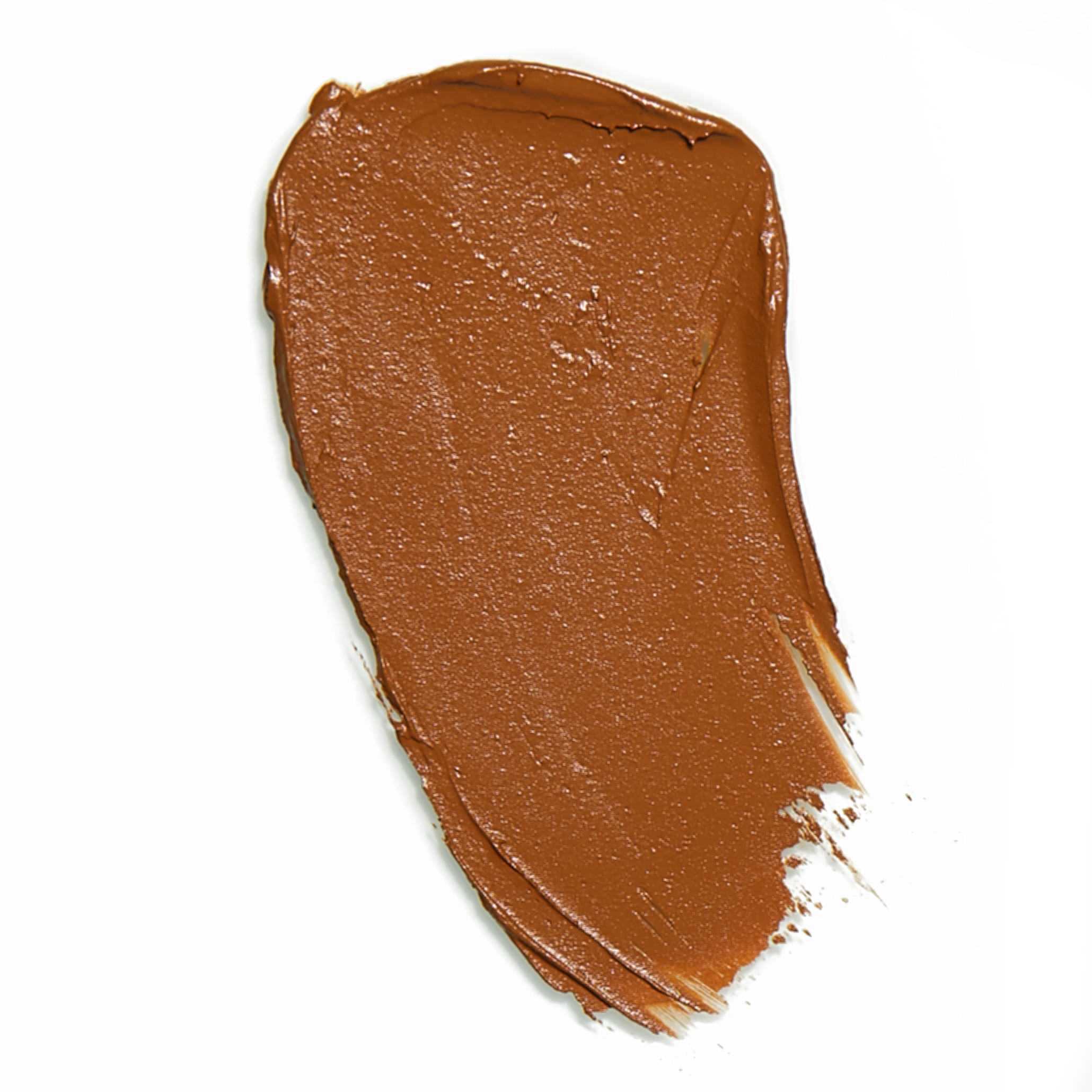 Risky makeup product in deep warm honey beige shade, showcasing its creamy texture and packaging.