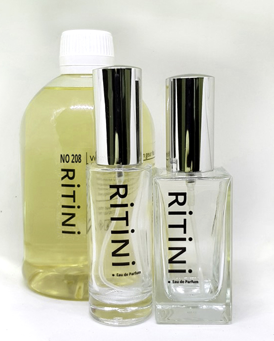 RiTiNi woman 053 - Chance perfume bottle with two empty refill bottles, inspired by Chance Chanel.