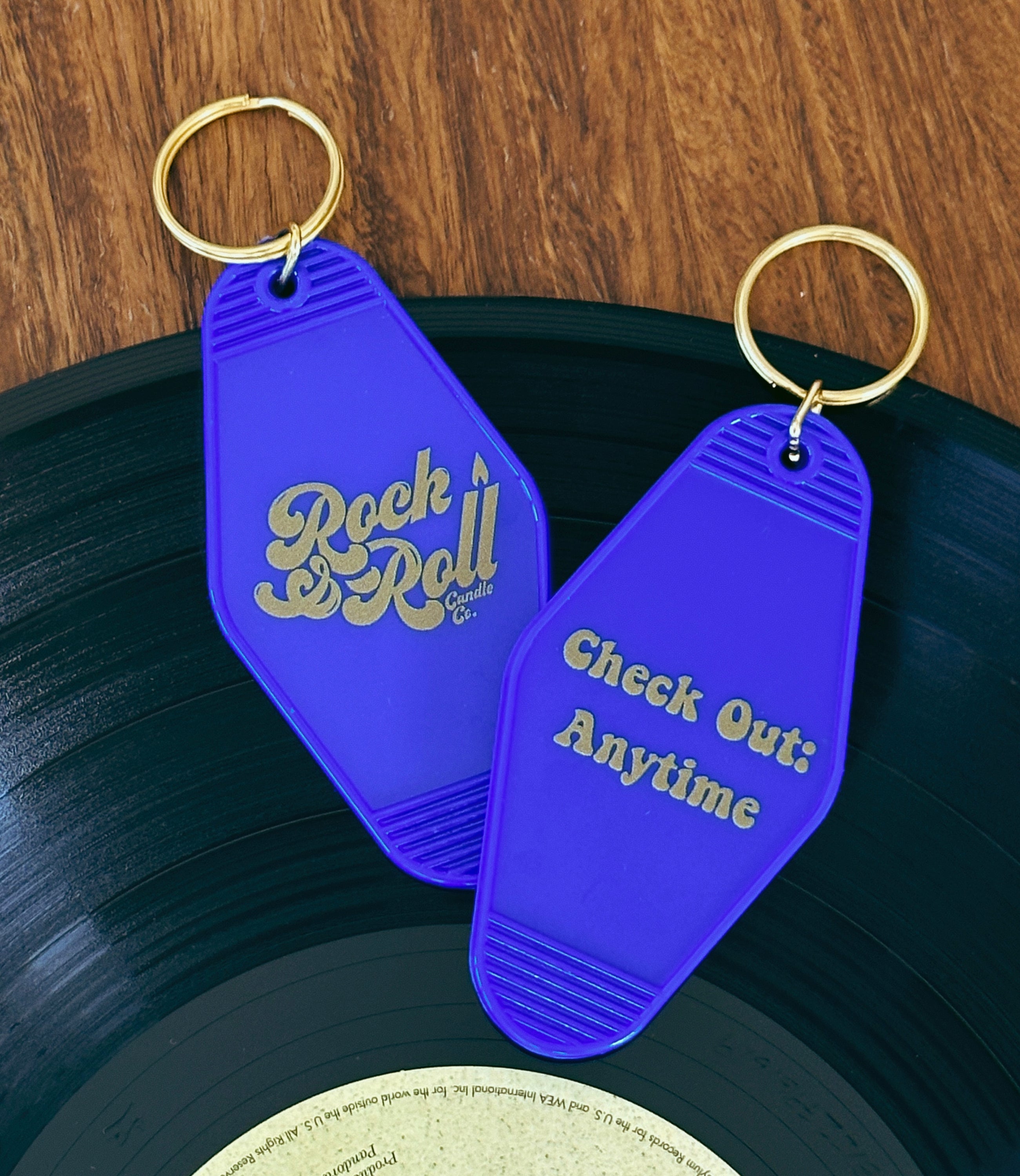 Rock & Roll Key Chain in royal blue with gold text, featuring a vintage motel-style design and a gold key ring.