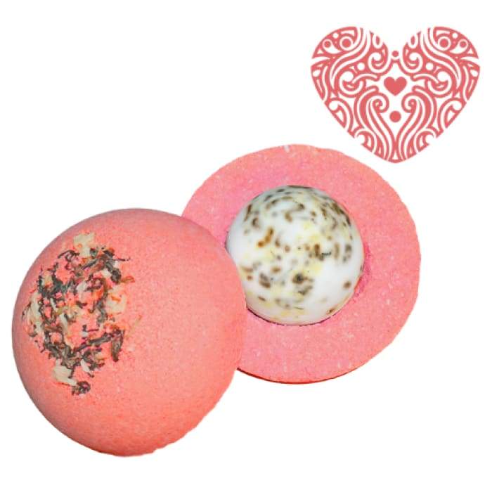 Romance - Bomb Core bath bomb with floral design and essential oils, revealing goat milk soap inside.