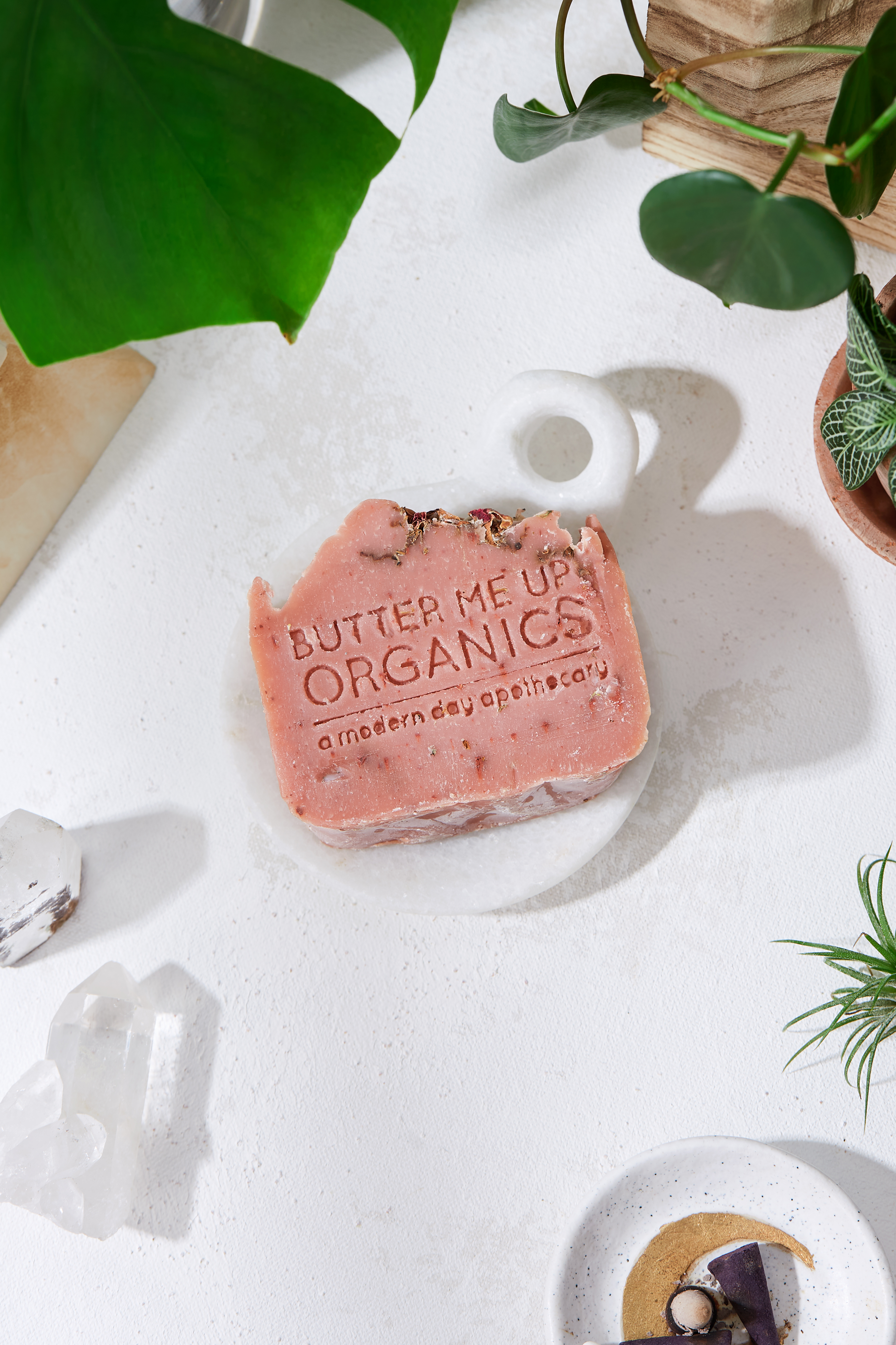 A beautifully handcrafted bar of Rose Garden Organic Soap, featuring natural pink clay, rose petals, and a rich, creamy texture, perfect for luxurious skincare.