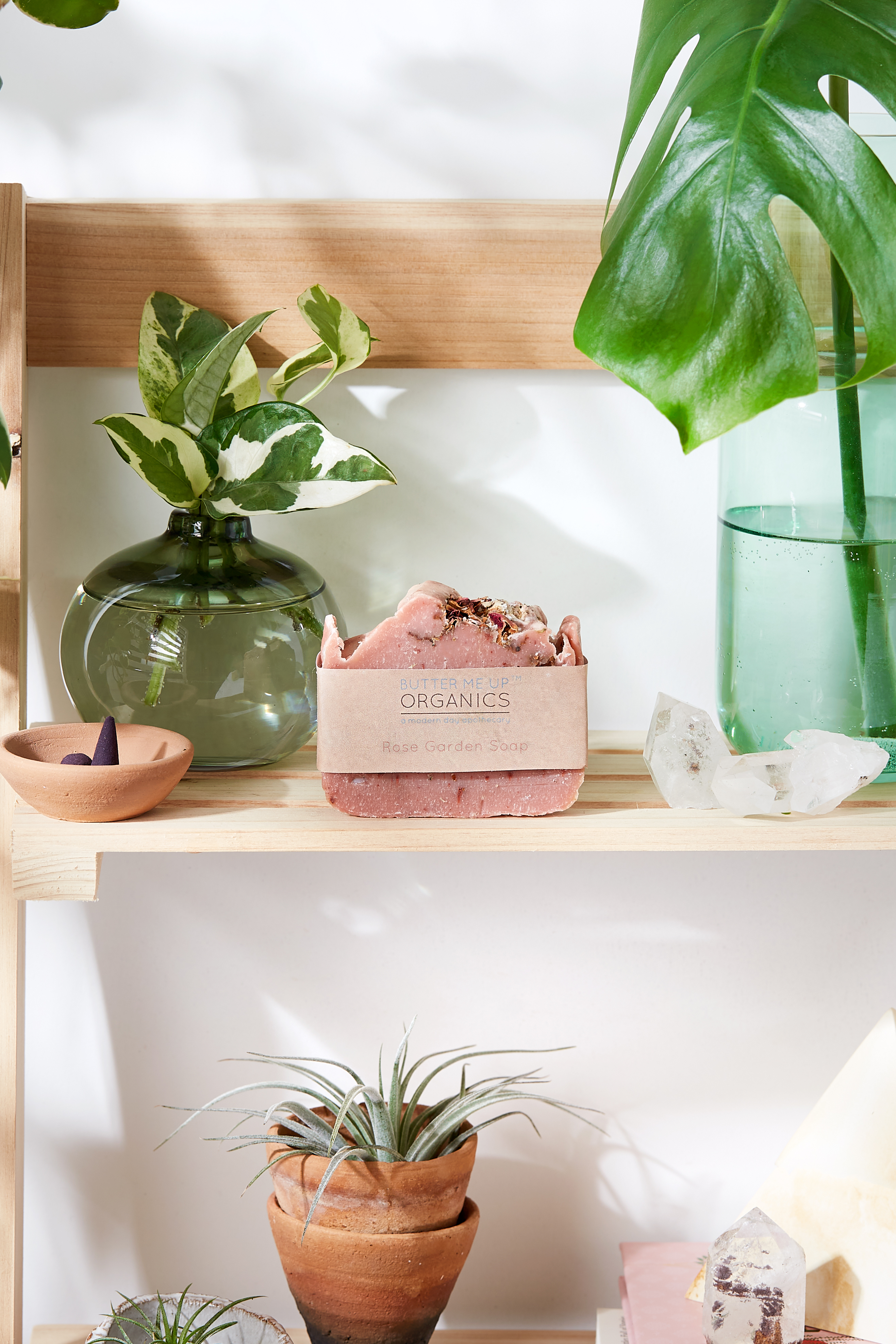 A beautifully handcrafted bar of Rose Garden Organic Soap, featuring natural pink clay, rose petals, and a rich, creamy texture, perfect for luxurious skincare.