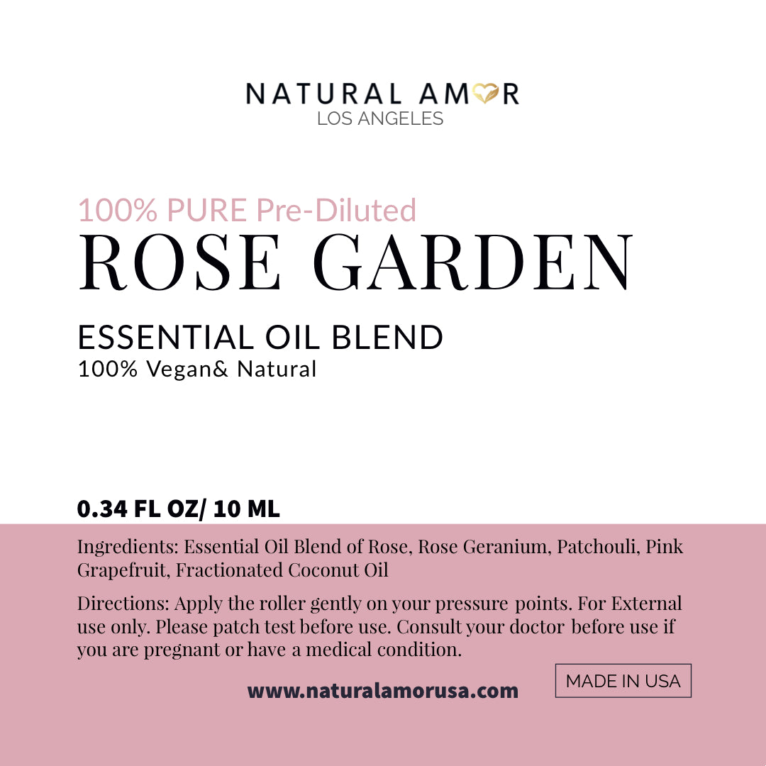 Rose Garden Roll On Essential Oil Blend in a 10 mL bottle with a stainless steel rollerball, showcasing its floral and earthy essence.