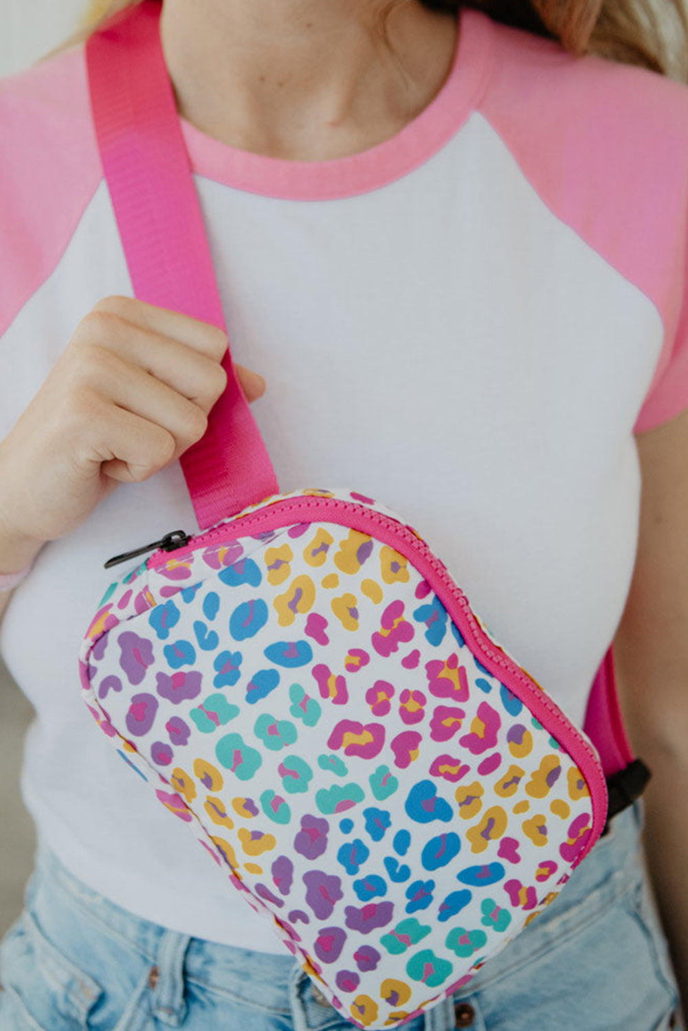 Rose Red Leopard Print Sling Bag with wide strap and zipper closure, showcasing a vibrant design perfect for casual outings.