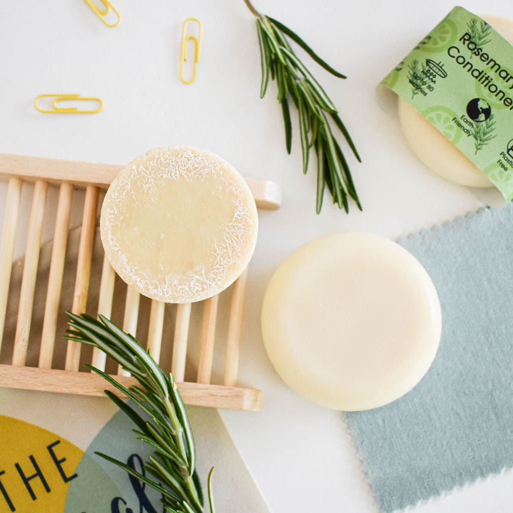 Rosemary Lime Shampoo and Conditioner Bar set, featuring eco-friendly solid bars with natural ingredients for vibrant hair.