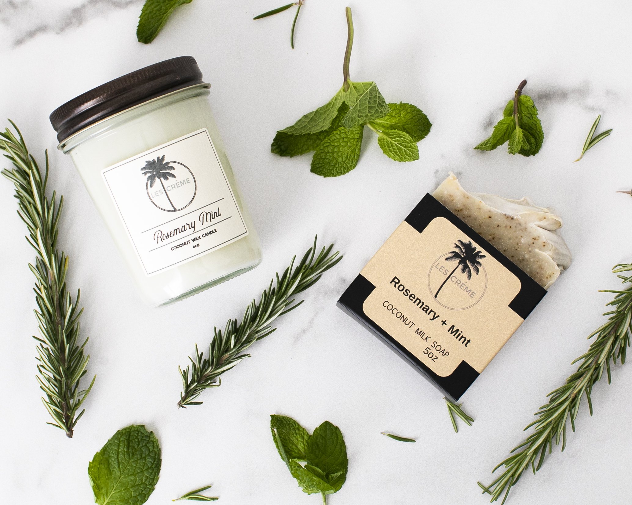 Rosemary Mint Scent Coconut Wax Candle in a stylish glass jar, showcasing its natural ingredients and inviting aroma.