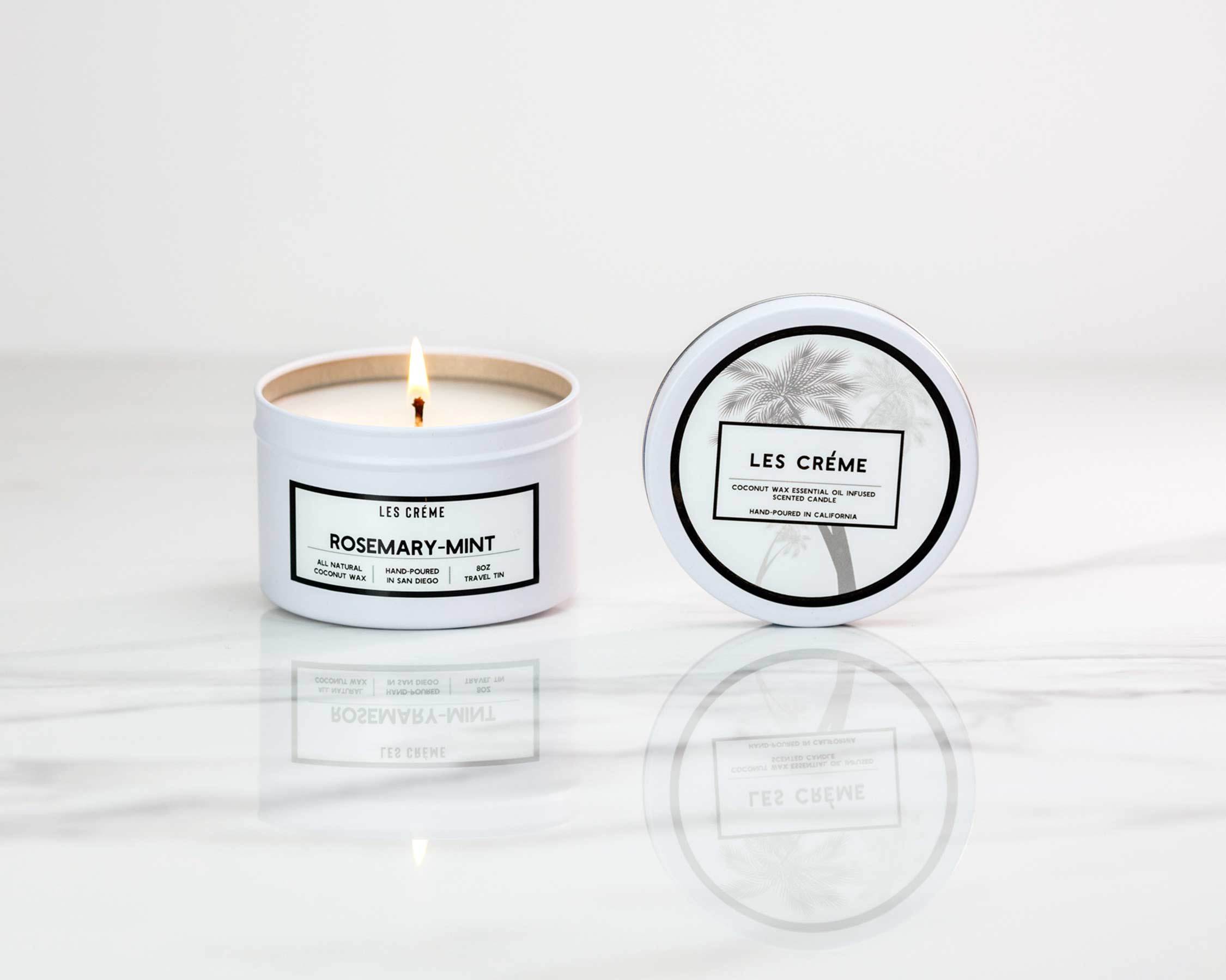 Rosemary Mint Scent Coconut Wax Candle in a stylish glass jar, showcasing its natural ingredients and inviting aroma.