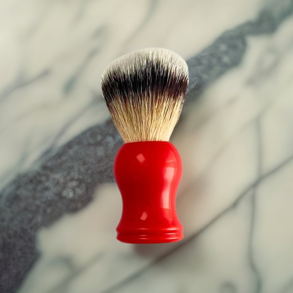 A stylish Shave Brush available in Black, Red, and White, featuring soft vegan bristles for a luxurious shaving experience.