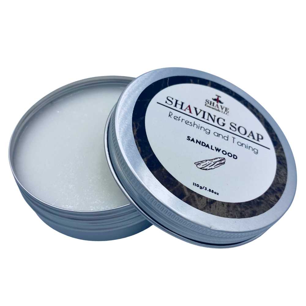 A luxurious shaving soap in a bowl with a shaving brush, showcasing rich lather and a classic barbershop scent.