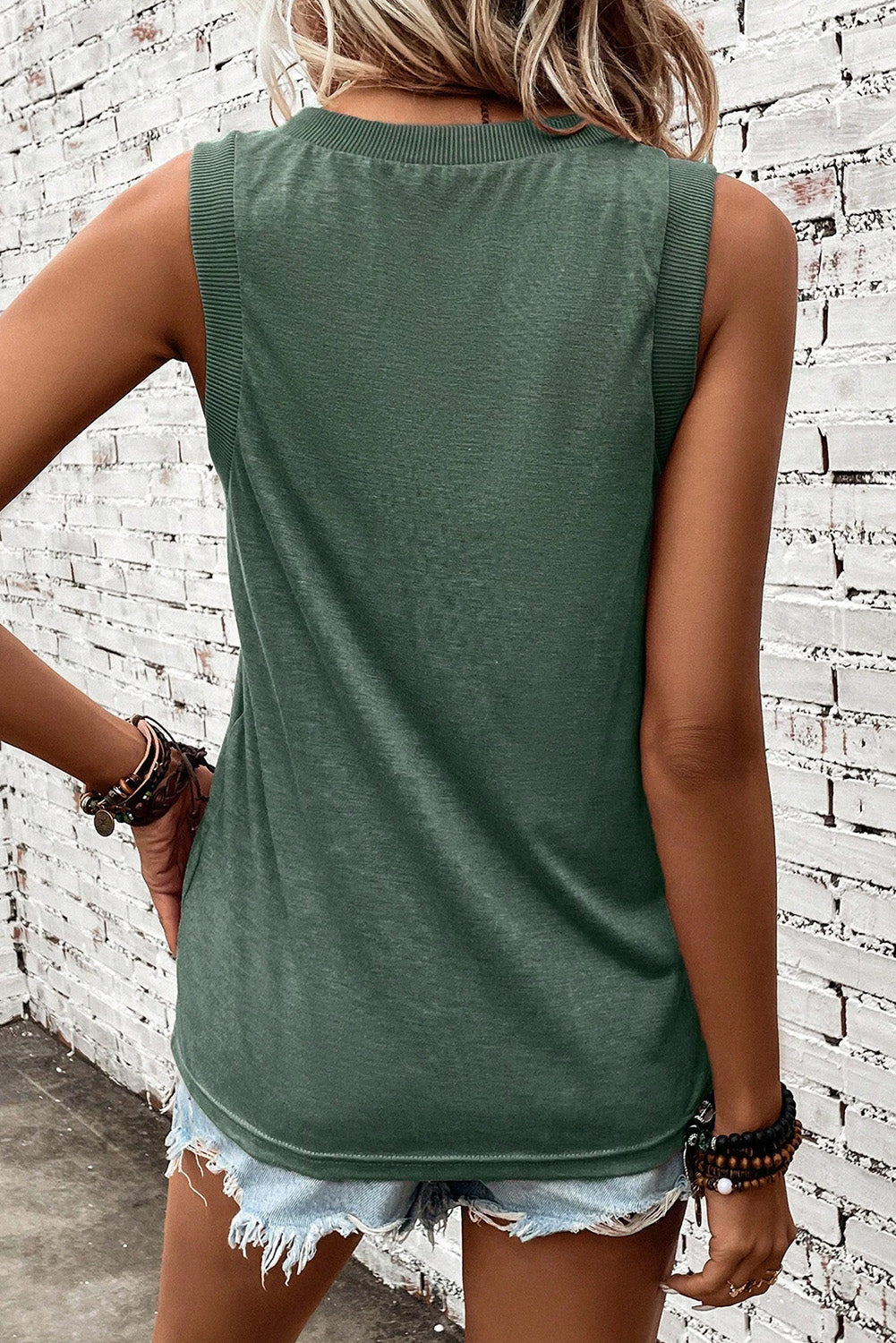 Simply Taupe Ribbed V Neck Tank top displayed on a mannequin, showcasing its stylish design and soft ribbed texture.