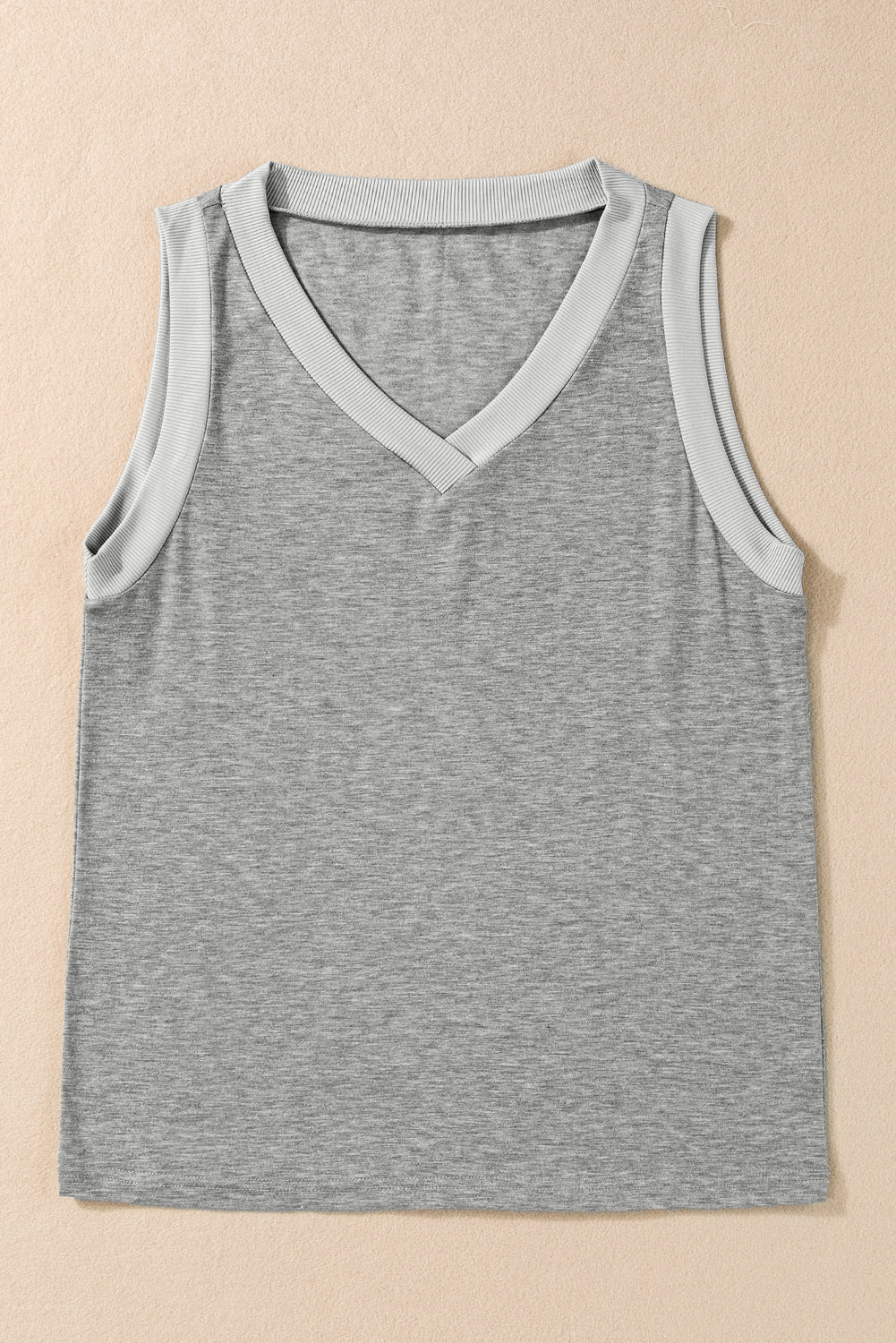 Simply Taupe Ribbed V Neck Tank top displayed on a mannequin, showcasing its stylish design and soft ribbed texture.