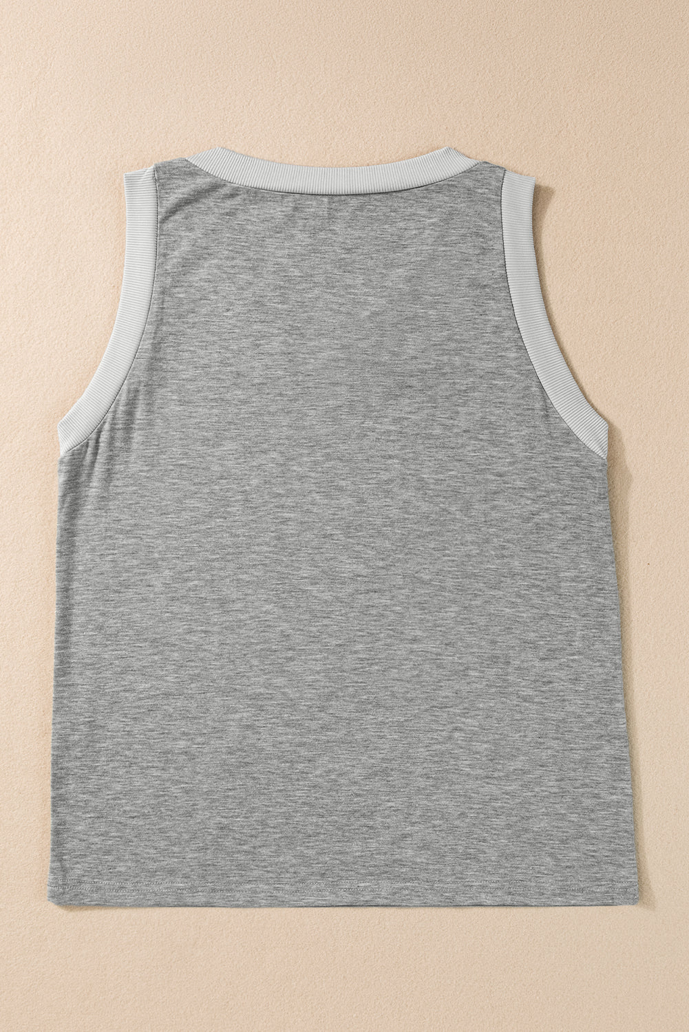 Simply Taupe Ribbed V Neck Tank top displayed on a mannequin, showcasing its stylish design and soft ribbed texture.