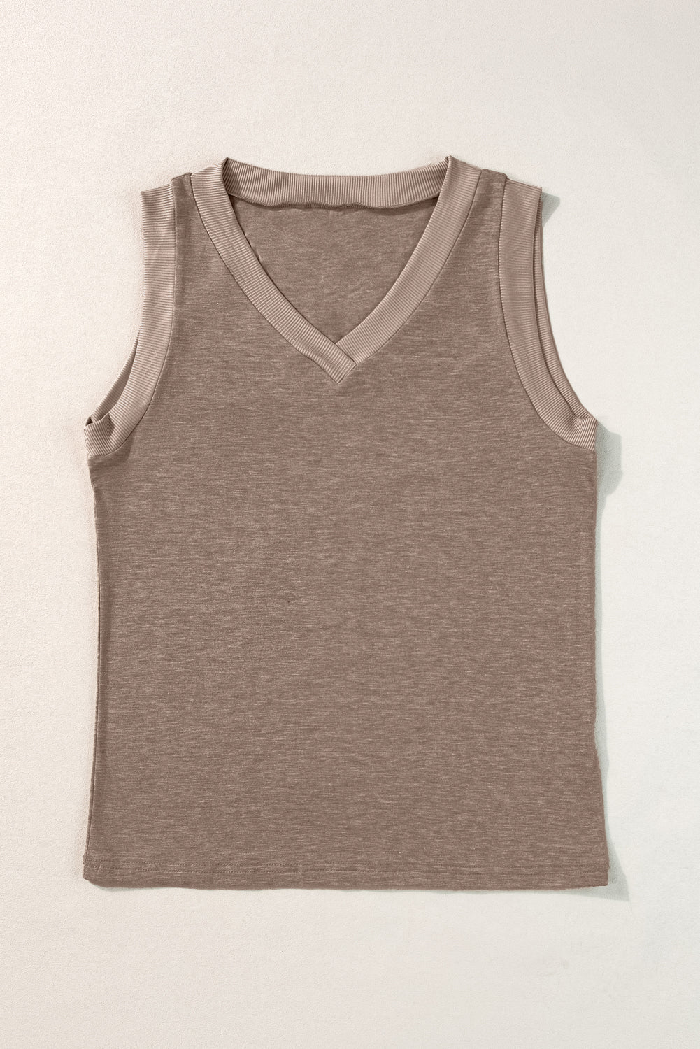 Simply Taupe Ribbed V Neck Tank top displayed on a mannequin, showcasing its stylish design and soft ribbed texture.