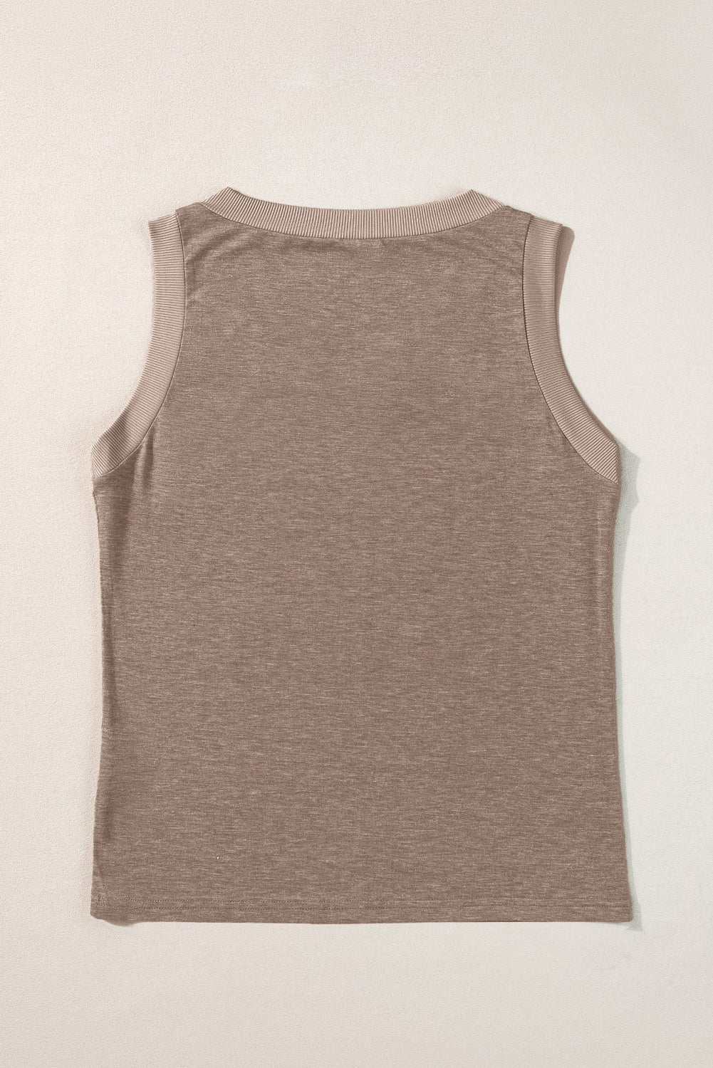 Simply Taupe Ribbed V Neck Tank top displayed on a mannequin, showcasing its stylish design and soft ribbed texture.