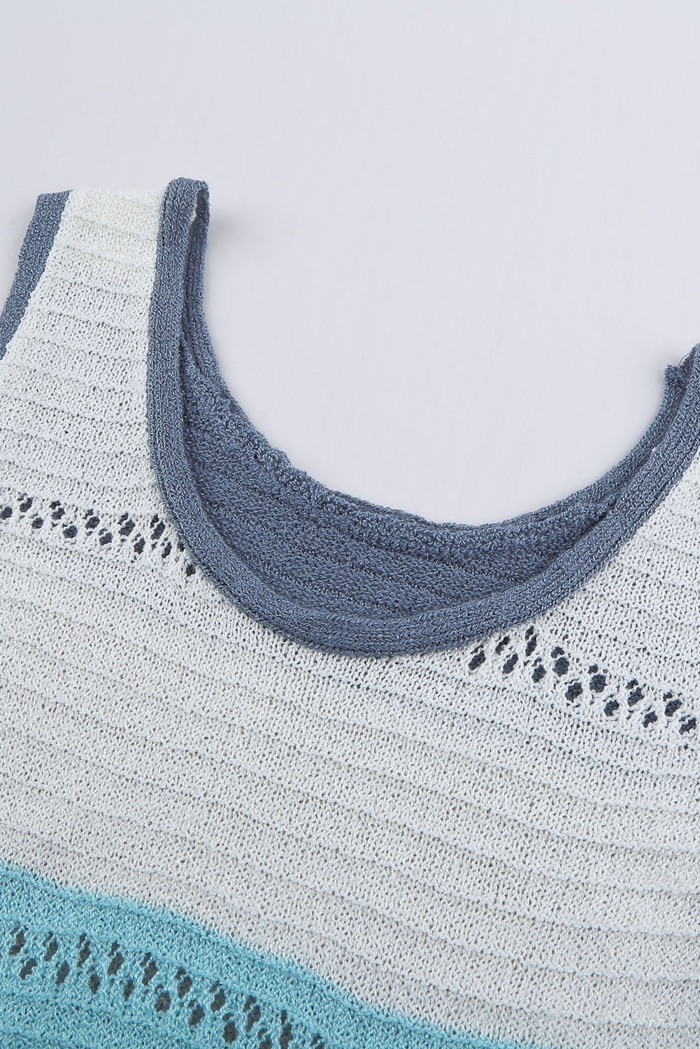 Sky Blue Color Block Knitted Tank Top showcasing a stylish design with a slim fit, perfect for casual or dressy occasions.