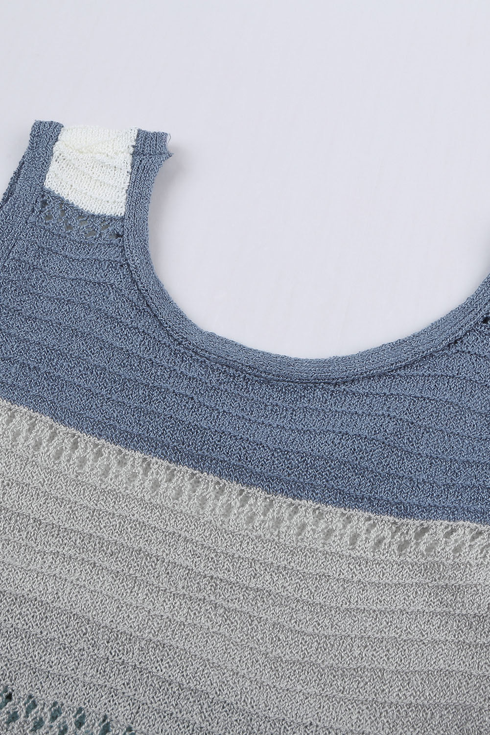 Sky Blue Color Block Knitted Tank Top showcasing a stylish design with a slim fit, perfect for casual or dressy occasions.