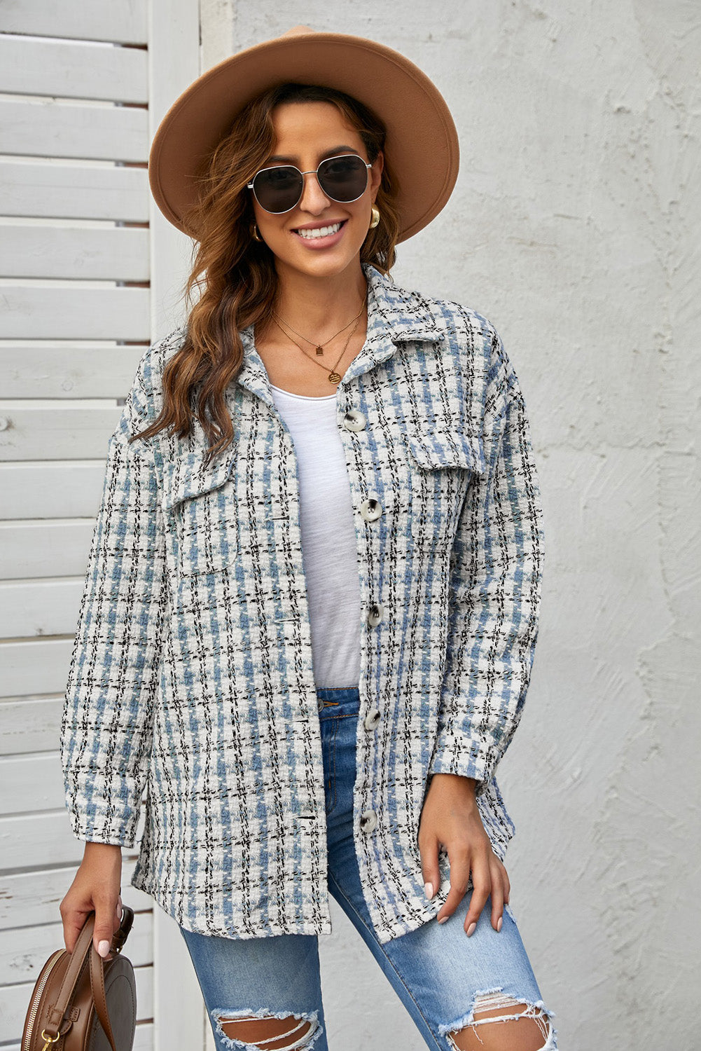 Sky Blue Plaid Print Button Knitted Jacket with Pocket, showcasing its stylish design and soft knitted fabric.